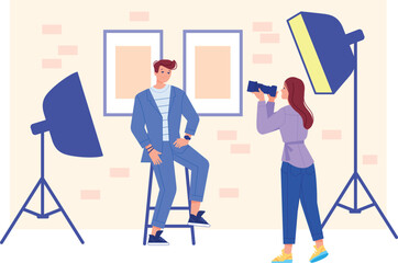 Professional photo studio. Photographer shooting male portrait