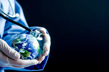 Doctor holding an Earth globe and a stethoscope in his hands, symbolizing the importance of global health and healthcare worldwide, with copy space.