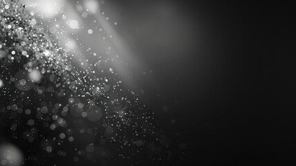 Abstract black and white bokeh lights effect - An artistic abstract background of light blurs and bokeh effects in grayscale, resembling a fantasy dust cloud - obrazy, fototapety, plakaty