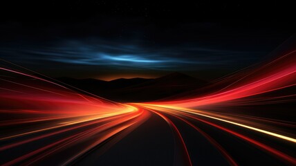 Fototapeta na wymiar Red and gold streaks on a highway through mountains - Image depicts dynamic red and gold light trails on a highway surrounded by mountains, indicating motion and travel