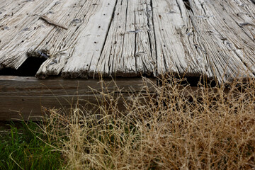 closeup of old fashioned, weathered wood boardwalk