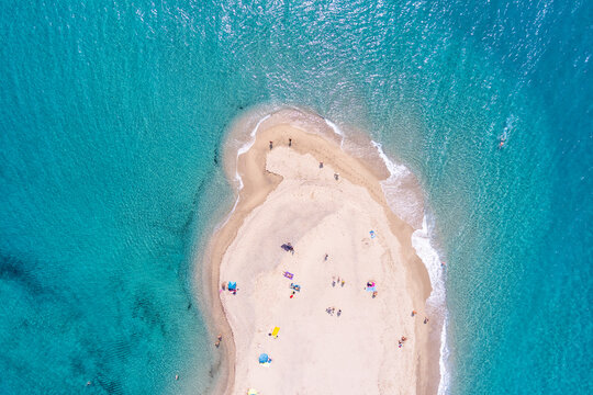 Aerial view of exotic sandy peninsula and sandy beach of Posidi with turquoise clear sea, Kassandra, Chalkidiki, North Greece