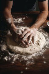 A photo from first person mixing ingredients for a homemade pizza in the kitchen showing hands kneading dough 
