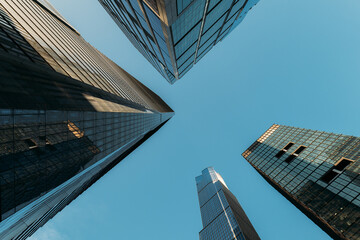 Looking Up at Skyscrapers in New York City with Clear Blue Skies