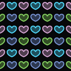 Rainbow heart seamless pattern on black background