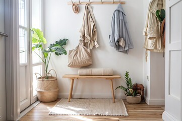 Minimalist Entryway: White Space with Bench, Coat Rack, Handbags, and Potted Plants