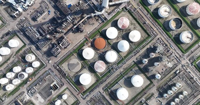 Aerial of large petrochemical complex at Pernis, crude oil is processed into useful products such as gasoline , kerosene , diesel and raw materials for the chemical industry. Aerial drone view, The