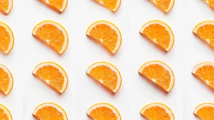 Foto op Plexiglas a group of orange slices sitting on top of a white table next to each other on top of a white surface. © Igor