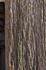An old weathered wooden post.