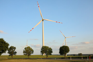 Renewable energy windmills on the field wiatraki na tle polskiego pola  © MR. Stanek