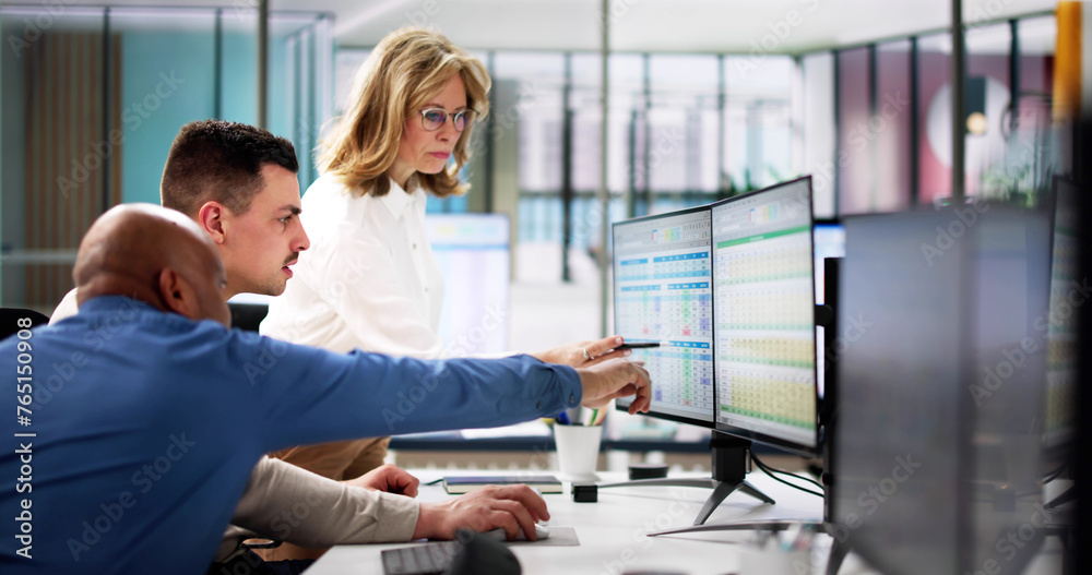 Poster analyst employee working on spreadsheet