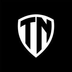 TN monogram logo with bold letters shield shape with black and white color design