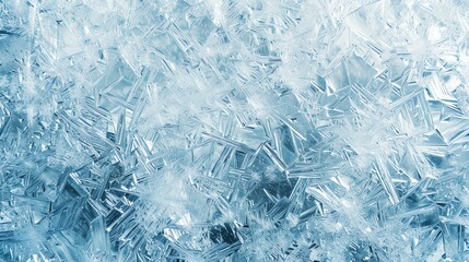 Background texture of ice crystals on a frozen window pane.