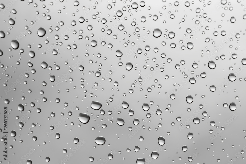 Poster Clear image of water droplets on a window. Suitable for various projects