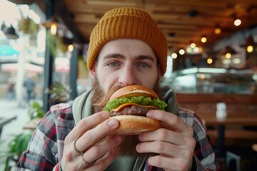 Bearded man eating yummy burger in cafe. Sit at pub bar handsome guy. Generate Ai