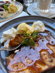 Coffee with ice cream and whipped cream on the table in Paris, France. 