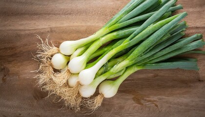 fresh spring onions on a table