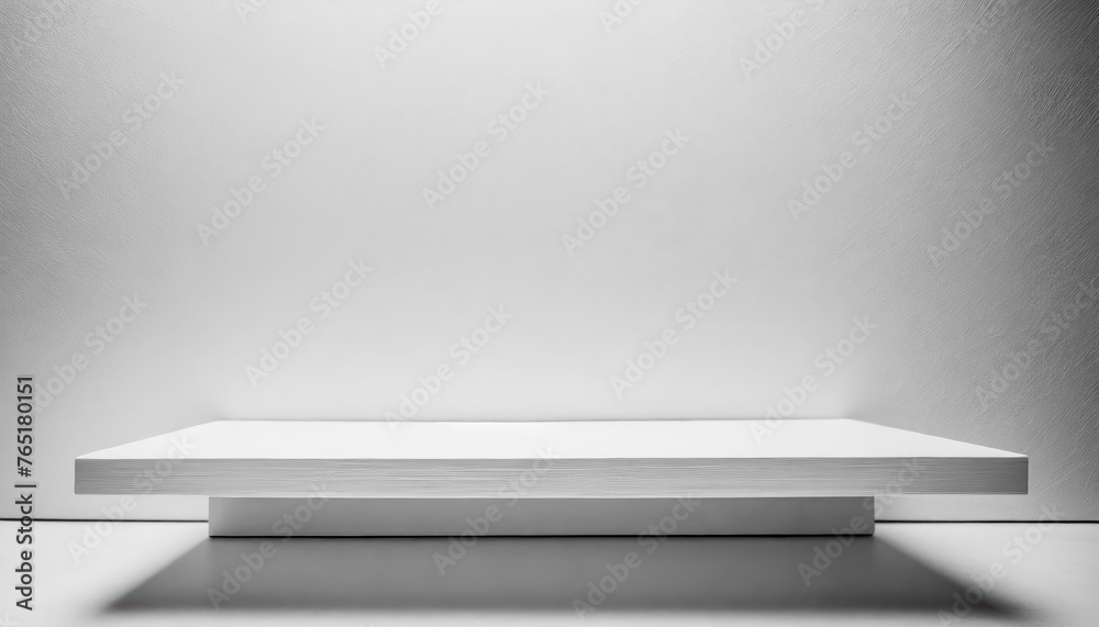 Poster a white shelf with a white wall behind it. the shelf is made of wood with free space as a podium for