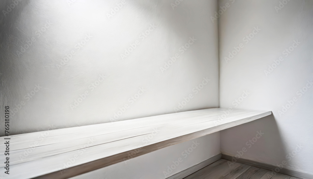 Poster a white shelf with a white wall behind it. the shelf is made of wood with free space as a podium for