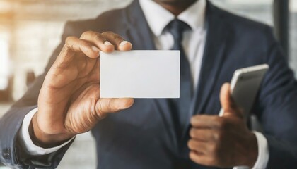 Businessman holding a Blank Business Card - Empty Business Card for Mockup - Template for Logo Design and Branding - Representation of Succesful Person