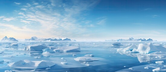Fototapeta na wymiar Group of icebergs in a water body