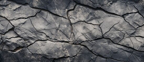 Cracked stone surface with fissures
