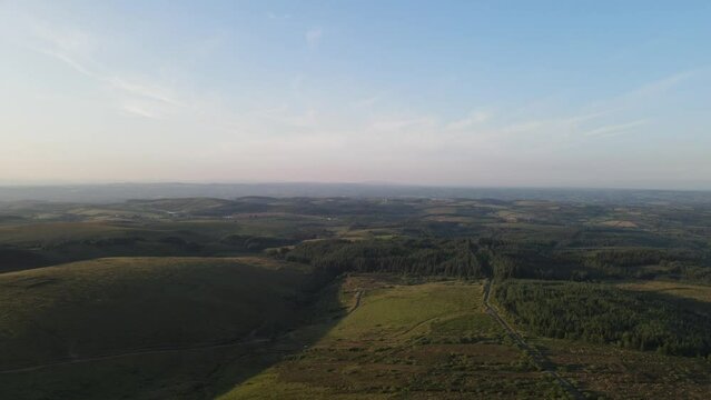 A drone pan of the green mountains and drumlins at Bragan Mountains, Co. Monaghan, Ireland