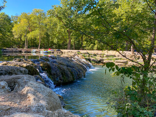Little Niagara Falls at Chickasaw National Recreation area. Travertine Creek waterfall and part of...