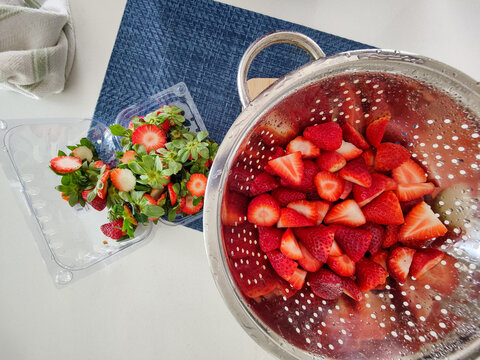 Cut Strawberries in Strainer
