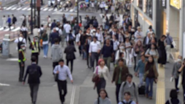Anonymous Crowds of People Walking in Central Tokyo, Japan