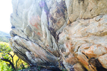 Cave paintings over five thousand years old painted on rocks in the Serra do Cipó region, Brazil