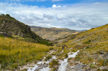 Mountains in the state of Minas Gerais in Brazil. They are part of the Serra do Cipó region.
