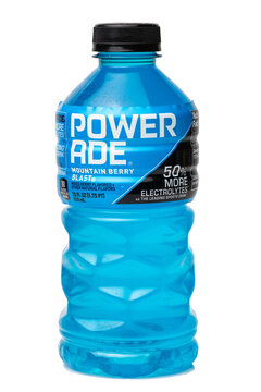 Isolated Bottle of Powerade brand mountain berry blast sport drink on transparent background	