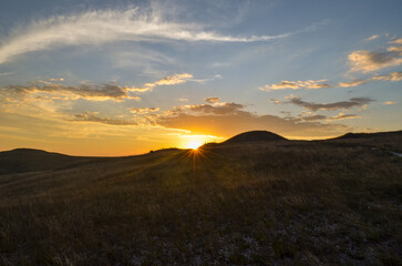 Sunlight at dusk in the mountains of the Serra do Cip&oacute; region in Minas Gerais, Brazil