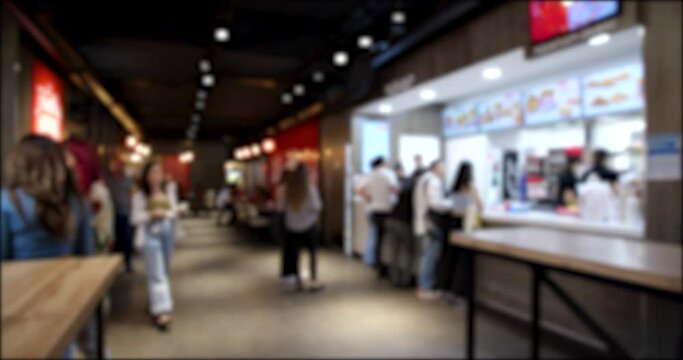 Time Lapse video of People Ordering from the Fast Food restaurant. Blurred background 4K video