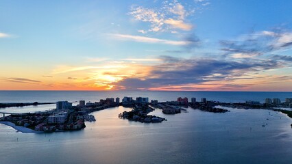 A drone photo of the unset looking at Clearwater Beach, Florida