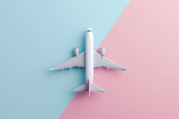 Model plane airplane on pastel color background.Flat lay design.