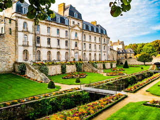 The Chateau de l'Hermine and its blossoming garden, the ermine castle built on the ramparts to the old town of Vannes in Brittany, Morbihan department, France