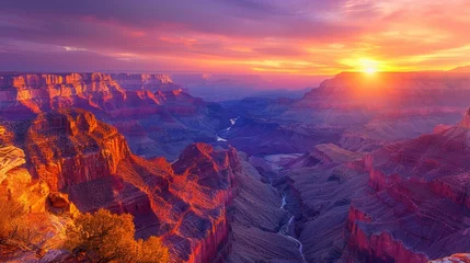 Poster Sun setting over Grand Canyon, coloring sky with natural beauty © yuchen
