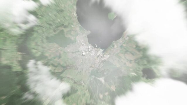 Earth zoom in from space to Rotorua, New Zealand. Followed by zoom out through clouds and atmosphere into space. Satellite view. Travel intro. Images from NASA