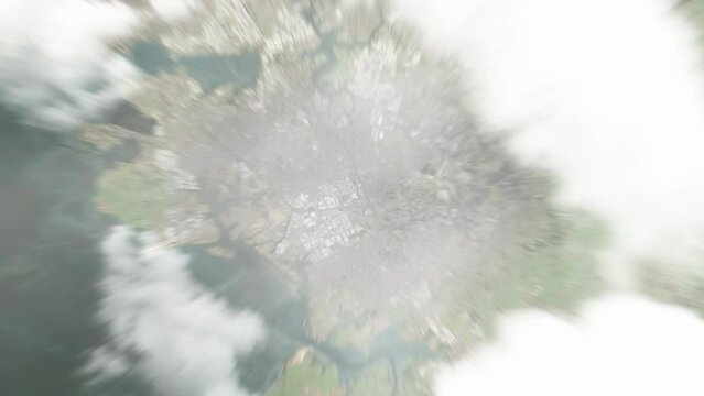Earth zoom in from space to Manukau, New Zealand. Followed by zoom out through clouds and atmosphere into space. Satellite view. Travel intro. Images from NASA