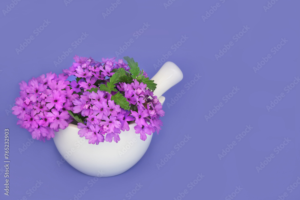 Wall mural verbena herb flowers in a mortar used in natural herbal medicine as a sedative, treats insomnia, dep