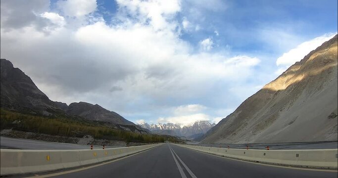Towards Passu Cones  - Driving on the Karakoram Range Mountains - Hunza Valley, Pakistan - KKH Highway