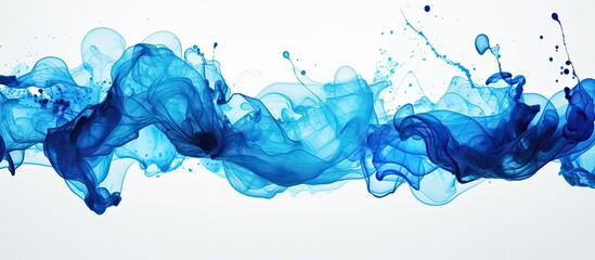 A detailed view of a liquid substance with a blue hue dispersing in a body of water