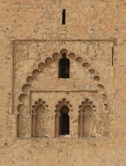 Minaret of the Koutoubia Mosque in the historic city of Marrakech (11th century). Morocco. 
Detail of decoration and windows of the south facade. UNESCO World Heritage. 