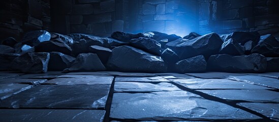 A detailed view of a cluster of rocks in a poorly-lit room