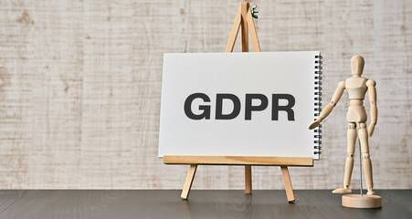 There is notebook with the word GDPR. It is an abbreviation for General Data Protection Regulation as eye-catching image. - obrazy, fototapety, plakaty