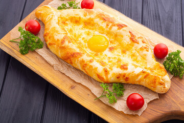 Homemade adjarian khachapuri with egg