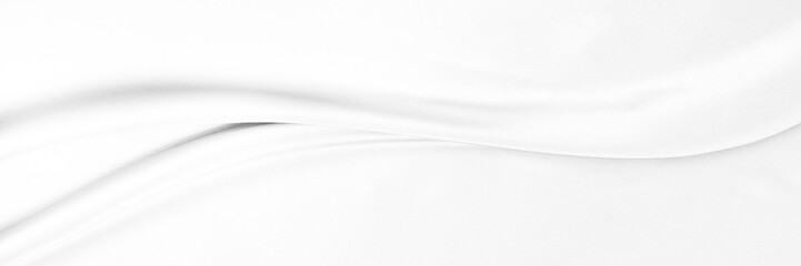 White gray satin texture that is white silver fabric silk panorama background with beautiful soft blur pattern natural.