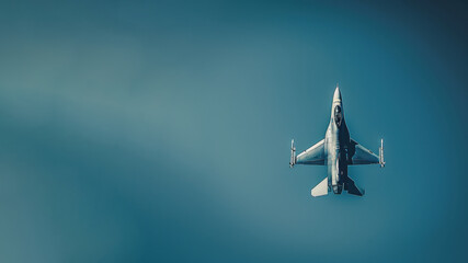 Fighter jet flight in blue sky, national security and defense concept